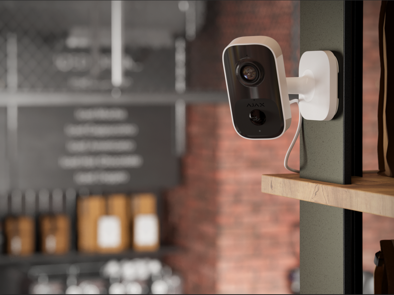 Ajax IndoorCam mounted on an interior wall